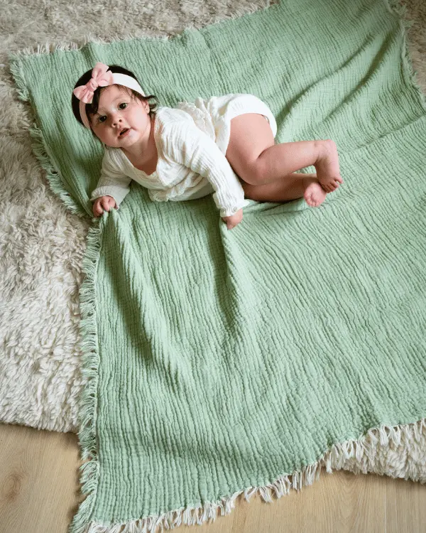 Alternative view of Little Fishies Gauze Receiving Blanket - Sage | Sand Cloud